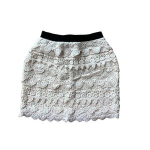 Forever 21 lacy in cream mini skirt. Size small.